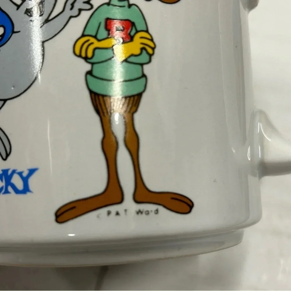 Vintage 1980’s Bullwinkle & Rocky coffee mug.  Great used condition Pat‎ Ward